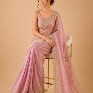Sitting pose of Women wearing Brown Embroidered Fendy Chiffon Saree for wedding, Party wear Outfit for UK Girls