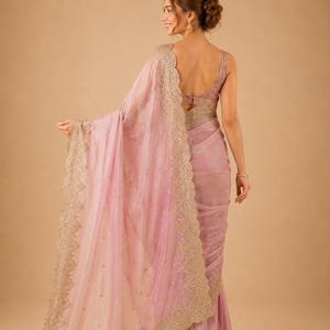 Back pose of Women wearing Pink Embroidered Fendy Chiffon Saree for wedding, Party wear Outfit for UK Girls