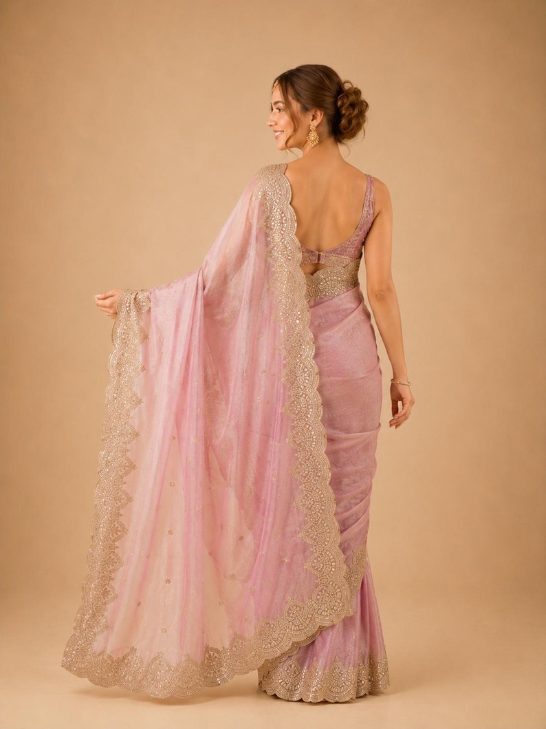 Back pose of Women wearing Pink Embroidered Fendy Chiffon Saree for wedding, Party wear Outfit for UK Girls