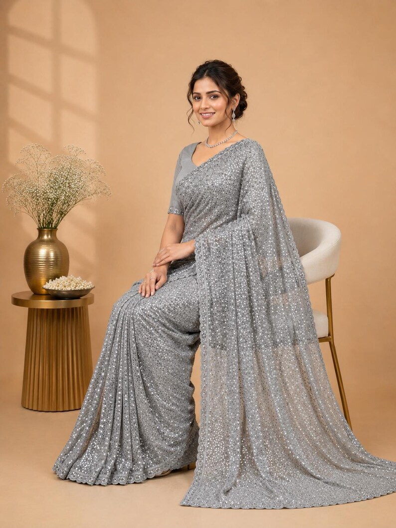 Modern met grey shimmer saree with lightweight net texture and glamorous evening appeal
