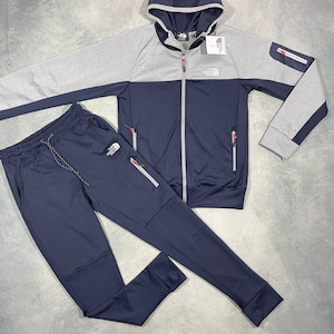 Das Unisex - Trainingsanzug-Set - Schwarze und Graue Herren Kapuzenjacke & Jogger