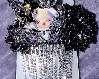 Clip per telefono a forma di teschio e panda scintillante: presa glamour per cellulare