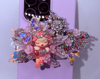 Clip per telefono a forma di teschio e panda scintillante: presa glamour per cellulare