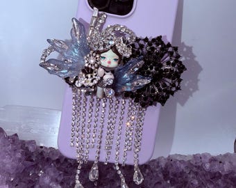 Clip per telefono a forma di teschio e panda scintillante: presa glamour per cellulare