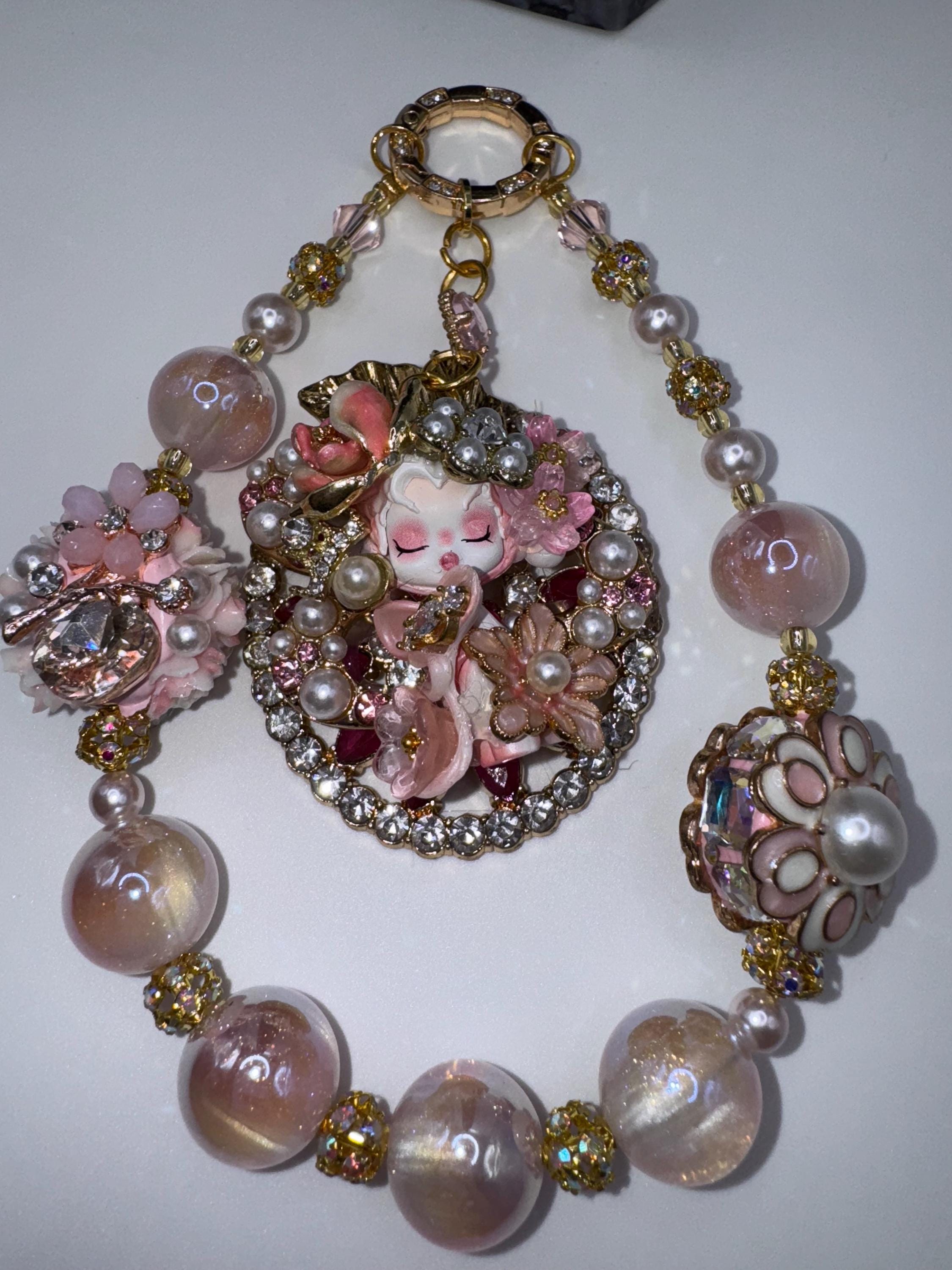 くれぷまページ　スカルパンダ水晶 スカルパンダクリスタルキーホルダー：キラキラ光る携帯チャーム