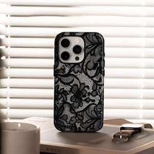 Vintage lace meets elegant black flowers, this phone case exudes elegance and romance. Delicate lace patterns paired with 3D black flower design, it balances beauty and texture perfectly. Compatible with iPhone12-17 full series (including Plus/Pro Max) and Samsung S22-S25 Ultra, scratch-resistant, drop-proof, slim and fit, supporting wireless charging. It adds sophistication to your device for daily commute, dates or parties, highlighting your unique taste.