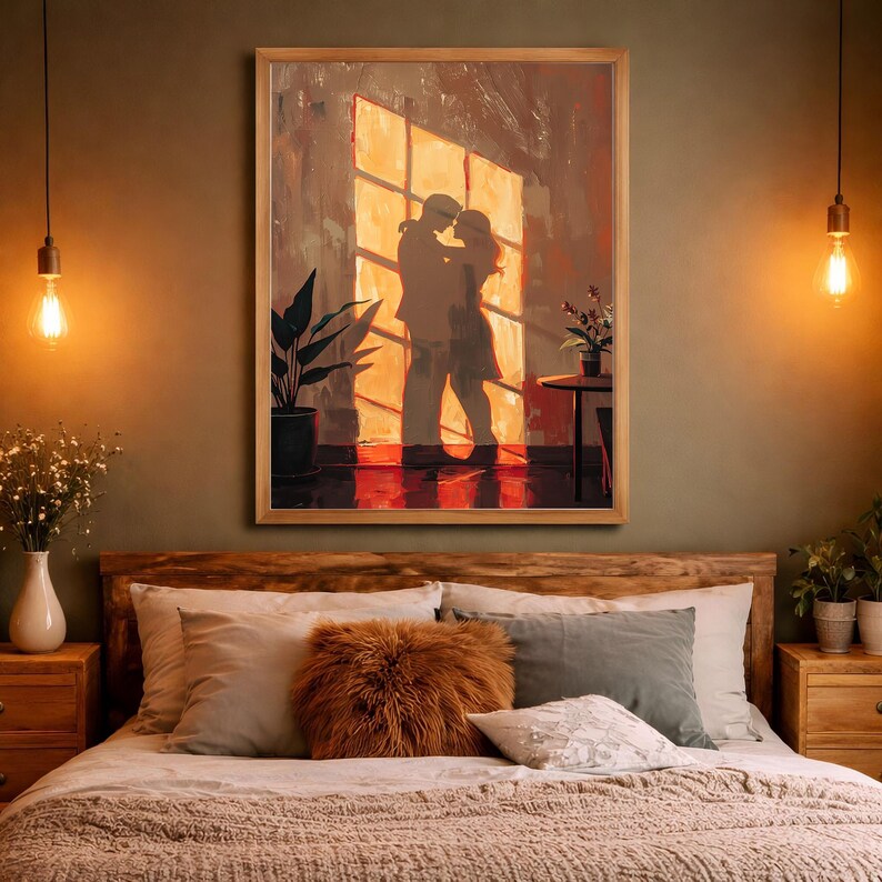May include: A framed artwork depicts a couple embracing in front of a window, bathed in warm sunlight. The painting features a palette of oranges, browns, and reds, with silhouettes of the figures. The artwork is displayed above a bed with pillows and a brown fur pillow.