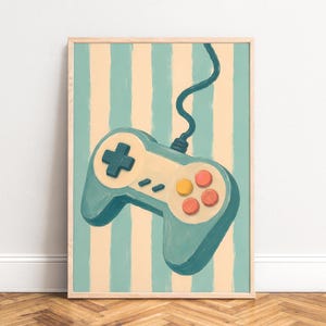 Può includere: Una stampa artistica da parete incorniciata con uno sfondo a righe color verde acqua e crema, raffigurante un'illustrazione dipinta di un controller per videogiochi color verde acqua. Il controller presenta una croce direzionale e quattro tasti.