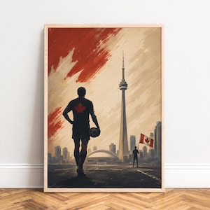 Peut inclure: Une impression d'art verticale encadrée montrant la silhouette d'un joueur de football tenant un ballon devant la ligne d'horizon de Toronto et la tour CN. Un grand motif de feuille d'érable rouge recouvre le ciel et un drapeau canadien est visible.