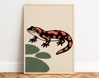 May include: A framed wall art print featuring a stylized illustration of a black and orange spotted salamander positioned above three dark green circular shapes on a light beige background, enclosed in a light-colored wooden frame.