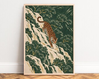 May include: A framed art print featuring a spotted leopard walking down a steep, light-colored rocky cliffside. The scene is surrounded by dark green, stylized evergreen trees and foliage, rendered in a bold, graphic illustration style.