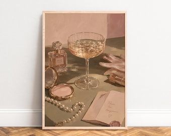 May include: A framed art print featuring a champagne coupe, a perfume bottle, a gold compact mirror, a string of pearls, a pair of gloves, and a small note with the handwritten text Pour toujours and a heart symbol in a warm, muted colour palette.