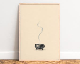 May include: A framed wall art print featuring a dark, rounded, three-legged incense burner centered on a light beige background. A thin, delicate wisp of gray smoke rises vertically from the center of the burner in a gentle, wavy pattern.