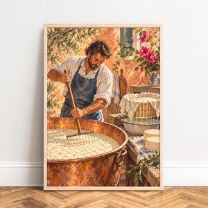 Pode incluir: Uma impressão de arte emoldurada retratando uma pessoa de avental azul usando um ancinho de madeira para mexer a coalhada em um grande tacho de cobre. Ao lado, queijos brancos sobre uma mesa de madeira, com flores de buganvília rosa ao fundo.