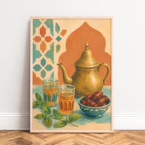 May include: A framed painting depicting a gold-coloured metal teapot, two clear glasses filled with amber liquid, a small blue bowl containing brown dates, and green mint leaves. The background features a geometric pattern and an arch shape.