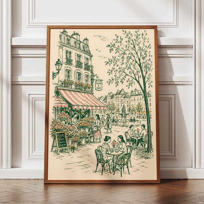 Puede incluir: Una l&aacute;mina art&iacute;stica enmarcada con un dibujo lineal de una escena callejera parisina con una florister&iacute;a y una cafeter&iacute;a. La ilustraci&oacute;n incluye un edificio con un toldo a rayas, un &aacute;rbol grande y personas sentadas. El texto dice Fleurs & Caf&eacute;.