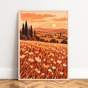 Könnte beinhalten: Ein rechteckiger Wandkunstdruck in einem hellen Holzrahmen mit einer Landschaftsillustration. Die Szene zeigt ein Feld mit hellen Blumen im Vordergrund, sanfte Hügel, hohe dunkle Zypressen und einen sonnigen Himmel in verschiedenen Orangetönen.