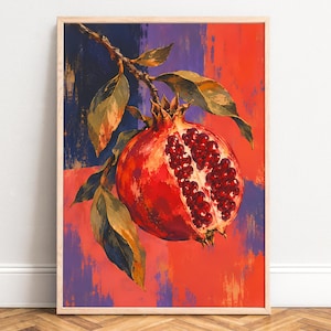 Könnte beinhalten: Ein gerahmter Kunstdruck mit einer lebendigen, malerischen Darstellung eines Granatapfels, der an einem Zweig mit grünen Blättern hängt. Die Frucht ist aufgeschnitten und zeigt tiefrote Kerne vor einem kräftigen orange-violetten Hintergrund.