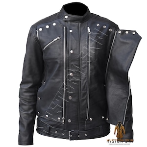 May include: Black leather jacket with a stand-up collar, multiple silver zippers, and snap closures. The jacket features a perforated design on the upper chest and shoulder areas, and a belt with a buckle at the waist.