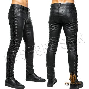 May include: Black leather trousers featuring lace-up detailing along the sides. The slim-fit trousers are displayed from the front and back. They are worn with black trainers.