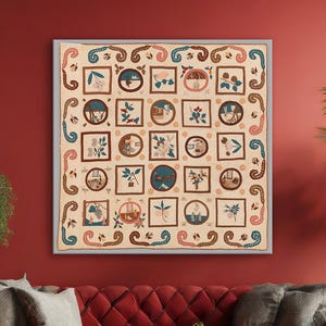 May include: A framed artwork featuring a repeating pattern of squares and circles with floral and geometric designs in shades of beige, brown, and blue. The artwork hangs above a red sofa with gray pillows. The room has a red wall, plants, and a wooden coffee table.