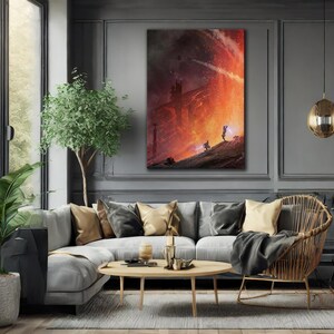 May include: A framed canvas art print depicting a dramatic, fiery scene with two figures on a hill. The artwork features a dark, ominous sky and a bright, orange and red explosion. The print is displayed above a gray sofa.