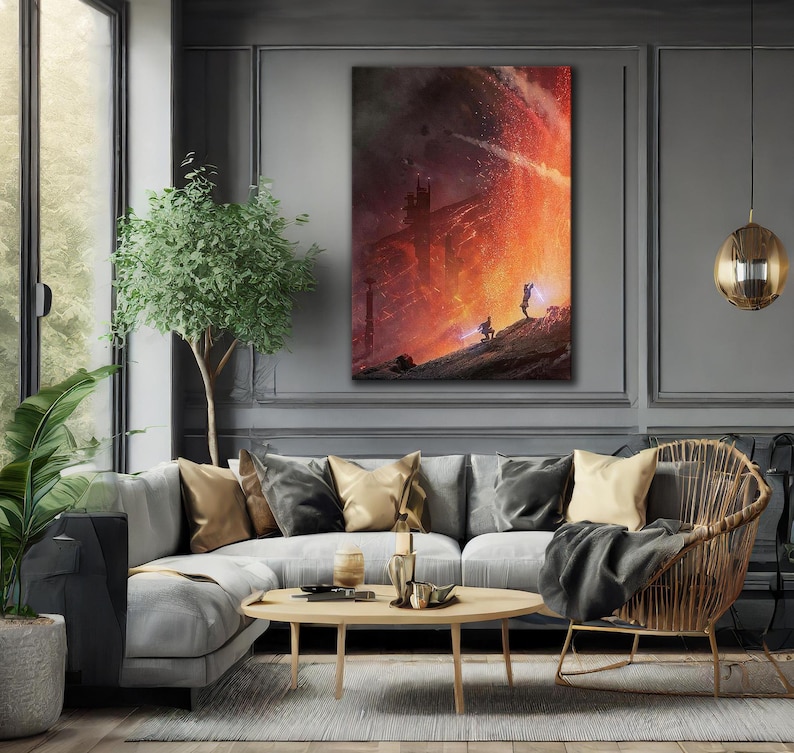 May include: A framed canvas art print depicting a dramatic, fiery scene with two figures on a hill. The artwork features a dark, ominous sky and a bright, orange and red explosion. The print is displayed above a gray sofa.