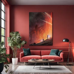 May include: A large framed canvas art print depicting a science fiction scene with two figures wielding lightsabers against a fiery backdrop. The artwork is displayed above a red sofa in a living room setting.