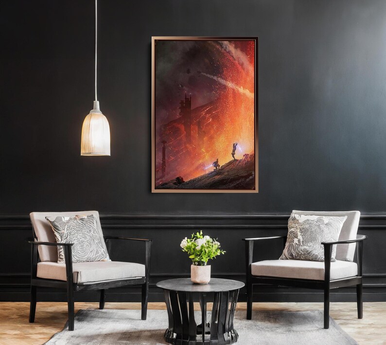 May include: A framed artwork depicting a dramatic, fiery landscape with figures on a hill. The artwork is in a room with two armchairs, a small table, and a hanging light fixture. The color palette includes shades of red, orange, and black.