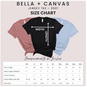 May include: A Bella + Canvas 3001 jersey tee size chart displaying three t-shirts in mauve, black, and light blue. The black shirt features white arrows indicating width and length. A table provides body length and chest width in inches.