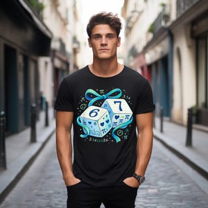 May include: Black t-shirt featuring a graphic of two dice with the numbers 6 and 7, decorated with mathematical symbols and a blue ribbon. The shirt is made of a soft material and is suitable for casual wear.