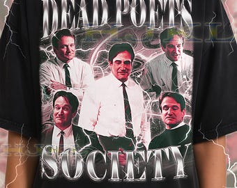 May include: Black adult unisex t-shirt featuring a graphic design with the words "DEAD POETS SOCIETY" in silver lettering. The design includes multiple images of a man in a white shirt and tie. The shirt has a crew neck.