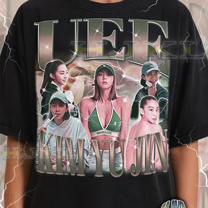May include: Black adult unisex t-shirt featuring a graphic design with the text "LEE KIM YUN" in a vintage style. The design includes images of several people. The shirt also has the text "ADULT Unisex Shirt : BLACK".
