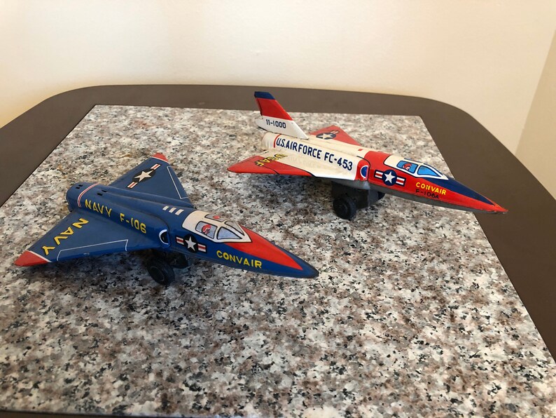 set of 2 vintage 1960s made in Japan tin airplanes