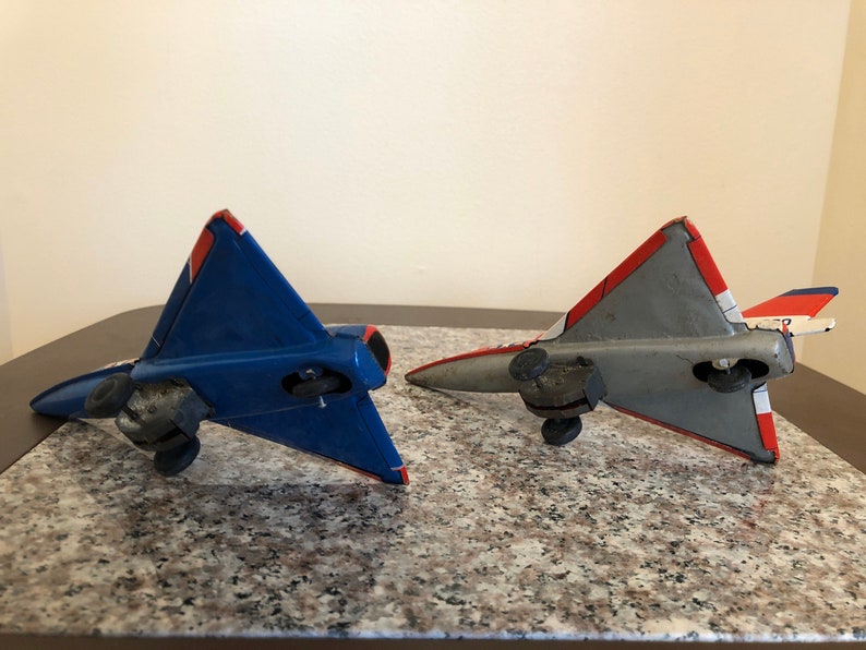 set of 2 vintage 1960s made in Japan tin airplanes