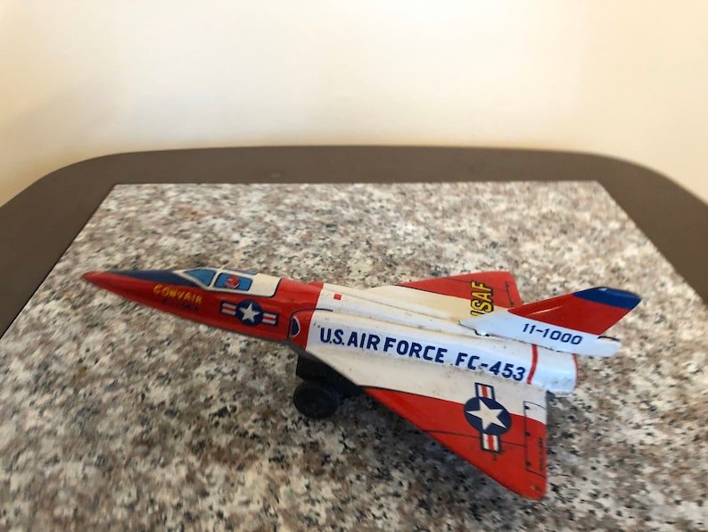 set of 2 vintage 1960s made in Japan tin airplanes