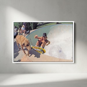 May include: A framed print of a vintage skateboarding scene. A person on a yellow skateboard is in a pool, with a dog walking nearby. Other people are in the background. The skateboard has the text "PowerFlex" on it.