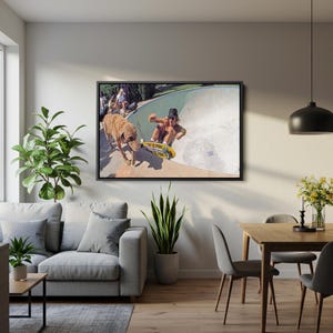 May include: A framed photograph captures a skateboarder in action within a concrete bowl, with a dog nearby. The skateboarder is wearing a black cap and riding a yellow skateboard. The image has a vintage aesthetic, with a warm color palette and natural lighting.