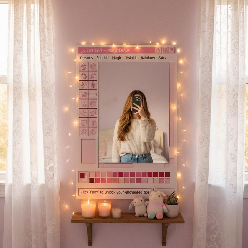 May include: A pink framed mirror with a computer interface design, featuring the text "untitled - MagicDraw". The mirror is decorated with fairy lights and sits above a wooden shelf with candles and plush toys. The text "Click 'Fairy' to unlock your enchanted tips!" is visible.