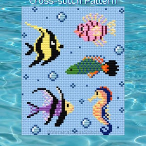 May include: A cross-stitch pattern featuring five colourful sea creatures on a light blue grid background. The design includes a yellow and black angelfish, a pink fish, a green and blue fish, a purple and black fish, and a yellow and orange seahorse.