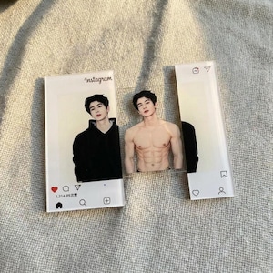 May include: Acrylic Instagram-style photo display featuring a man in two poses. One image shows him in a black hoodie, the other shirtless. The display includes Instagram icons and the word "Instagram".