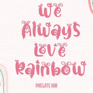 K&ouml;nnte beinhalten: Rosa Text auf wei&szlig;em Hintergrund: "We Always Love Rainbow". Die Buchstaben in einer verspielten Schriftart sind mit Hasenohren verziert. Das Pixelate Hub-Logo befindet sich unten.