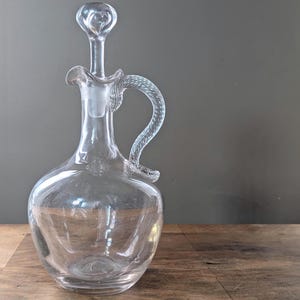 Crystal carafe with cut stopper and twisted handle, Saint Louis style corolla neck, rare vintage piece from the 20th century, antique tableware