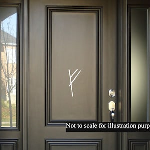 May include: A dark brown wooden door with a single white symbol on the front panel. The symbol is a stylized letter "F" with two diagonal lines. The door has a glass window on the left side and a smaller glass window on the right side. The text "Not to scale for illustration purposes" is printed at the bottom of the image.