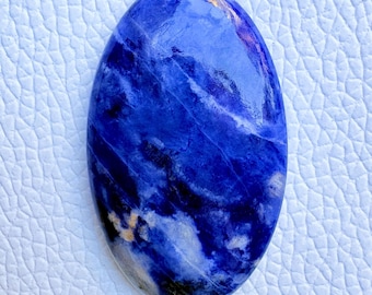 Natuurlijke ovale sodaliet cabochon voor het maken van sieraden, handgepolijste blauwe edelsteen (44 x 26 x 6 mm)