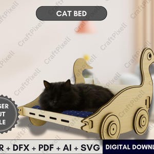 May include: A wooden cat bed shaped like a swan, with a black cat resting inside. The bed has a blue patterned cushion and is designed with wheels. The text "CAT BED" is at the top, and "LASER CUT FILE" is on a badge.