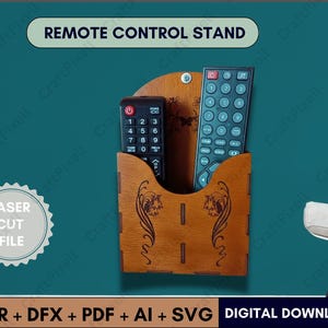 May include: A wooden remote control stand with two remote controls inside. The stand is brown with decorative floral cutouts. The text "REMOTE CONTROL STAND" is at the top. The image also includes the text "LASER CUT FILE" and "DIGITAL DOWNLOAD".