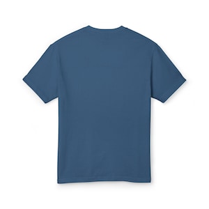 May include: A solid blue t-shirt with short sleeves. The shirt is made of a soft material and has a crew neck. The back of the shirt is visible, showing the simple design and color.