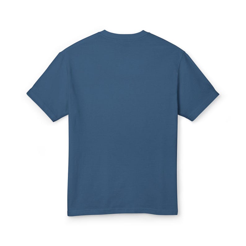 May include: A solid blue t-shirt with short sleeves. The shirt is made of a soft material and has a crew neck. The back of the shirt is visible, showing the simple design and color.