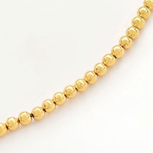 Conjunto de 50 miçangas redondas de prata de lei 925 com banho de ouro, 2 mm. :vm0025
